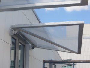 US EMBASSY IN LAOS OFFICE BUILDING AND ENTRANCE CANOPIES.